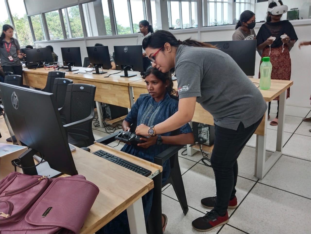 Mentor teaching a learner to operate a drone controller